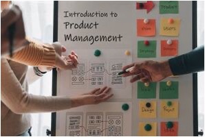 People pointing at a whiteboard during a presentation titled 'Introduction to Product Management,' with sticky notes labeled 'Problem,' 'Users,' 'Design,' and 'Report'.