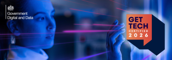 Promotional banner for Government Digital and Data's “Get Tech Certified 2026” campaign. The image shows a person in a blue-lit technology environment interacting with a transparent digital surface. Purple light streaks run across the image, creating a futuristic effect. The Government Digital and Data logo appears in the top-left corner, and a large orange and navy badge on the right contains the text “GET TECH CERTIFIED 2026.
